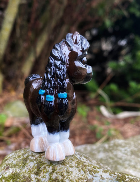 Bay Pony with braids